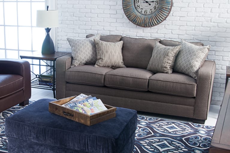 The Greyson sofa in a living room.