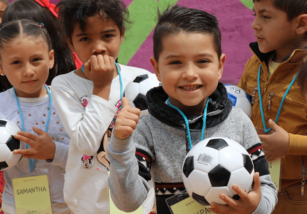 Around the Worlds, Around the World donates new soccer balls to children all across the globe.