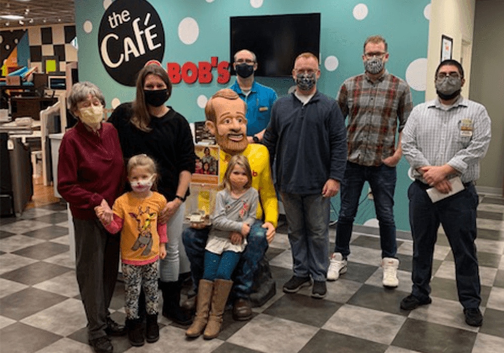 The Dykstra family with Miss Shock at Bob's Discount Furniture.