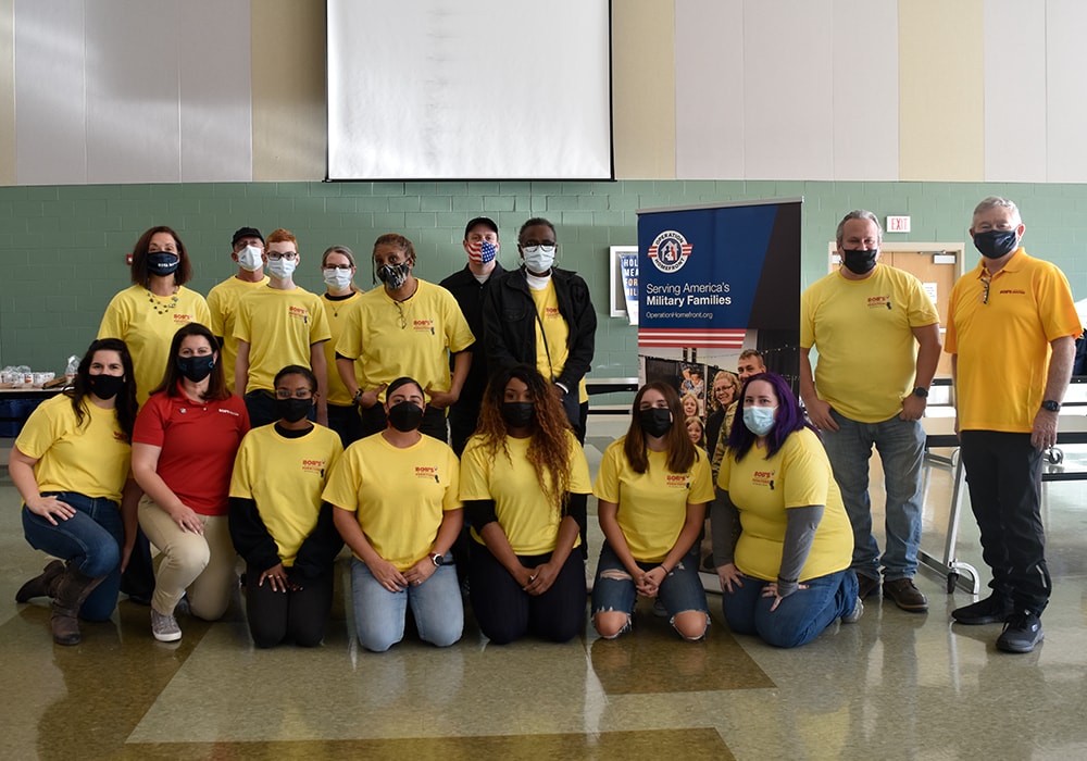 A group of Bob's Discount Furniture employees volunteered at an Operation Homefront Holiday Meals for the Military event.