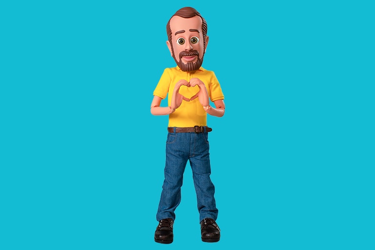 Little Bob makes a heart shape with his hands | Bob's Discount Furniture