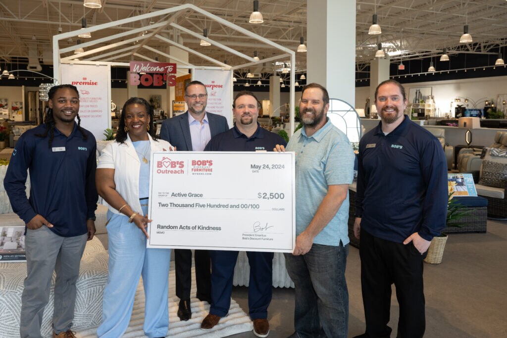 Bob’s Discount Furniture presented a $2,500 Random Acts of Kindness donation to Active Grace, representing their commitment to supporting the community. Ryan Chapman, Executive Director, accepted the donation from Store manager Stephen Morgan (center, right), Bob’s Vice President of Retail Operations, Chuck James (center, left) and Bob’s regional director, Cody Blakemore (left).