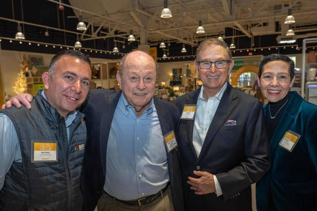 Bob’s executives and stakeholders gather at Bob’s new flagship experience store in Somerville. From left to right: Nick Wood, Vice President of Pricing, Ted English, Chairman of the Board, Bill Barton, President & CEO, Carol Glaser, Executive Vice President, Chief Merchandising Officer.