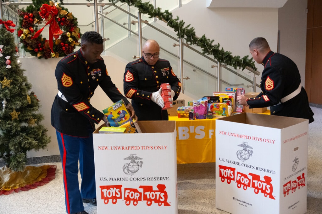 SSgts. Cummings, Pacheco, and Rivera from Tots for Tots Plainville picked up toys in Bob's Home Office in Connecticut.