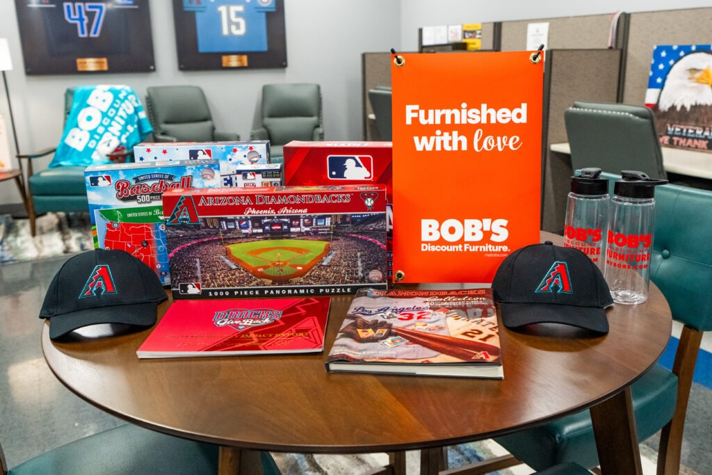 The Arizona Diamondbacks Foundation and Bob’s Discount Furniture surprise veterans with a newly renovated community space at Catholic Charities’ MANA House on August 21, 2025 in Phoenix, Arizona. (Photo by Kelsey Grant/Arizona Diamondbacks)