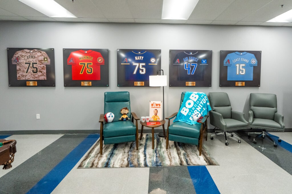 PHOENIX, AZ — AUGUST 21: The Arizona Diamondbacks Foundation and Bob’s Discount Furniture surprise veterans with a newly renovated community space at Catholic Charities’ MANA House on August 21, 2025 in Phoenix, Arizona. (Photo by Kelsey Grant/Arizona Diamondbacks)