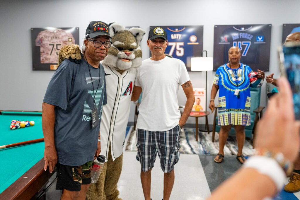 The Arizona Diamondbacks Foundation and Bob’s Discount Furniture surprise veterans with a newly renovated community space at Catholic Charities’ MANA House on August 21, 2025 in Phoenix, Arizona. (Photo by Kelsey Grant/Arizona Diamondbacks)