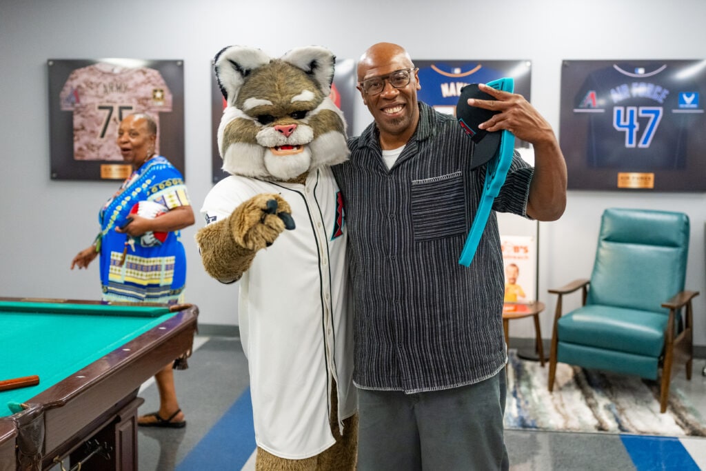 The Arizona Diamondbacks Foundation and Bob’s Discount Furniture surprise veterans with a newly renovated community space at Catholic Charities’ MANA House on August 21, 2025 in Phoenix, Arizona. (Photo by Kelsey Grant/Arizona Diamondbacks)