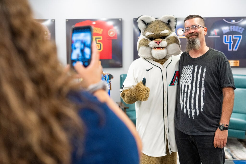 The Arizona Diamondbacks Foundation and Bob’s Discount Furniture surprise veterans with a newly renovated community space at Catholic Charities’ MANA House on August 21, 2025 in Phoenix, Arizona. (Photo by Kelsey Grant/Arizona Diamondbacks)