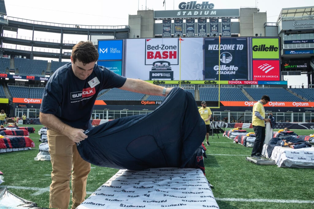 Volunteers from the New England Patriots Foundation helping out at the Bed-Zone Bash.