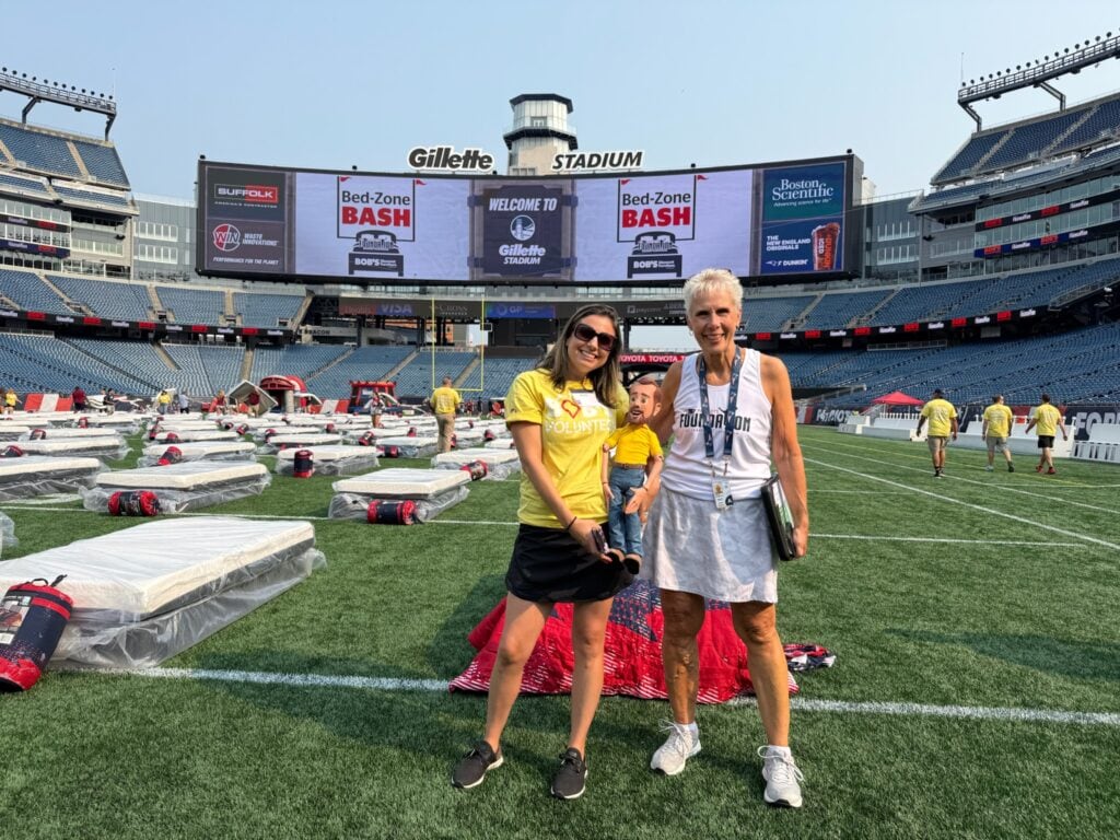 Randi Wojnilo, Social Media Manager for Bob's poses with Little Bob and Donna Spigarolo, Director of Community Relations for the New England Patriots.
